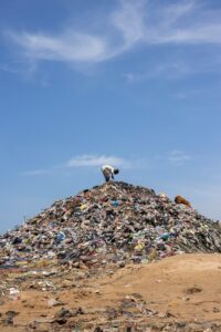 man working at garbage dump