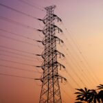 electric tower silhouette at sunset