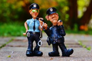 police man and police woman plastic toy on fllow