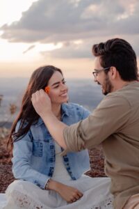 romantic couple enjoying sunset outdoors