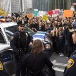 stockcake-protestors_confront_police-1178885-medium9022178172005657013